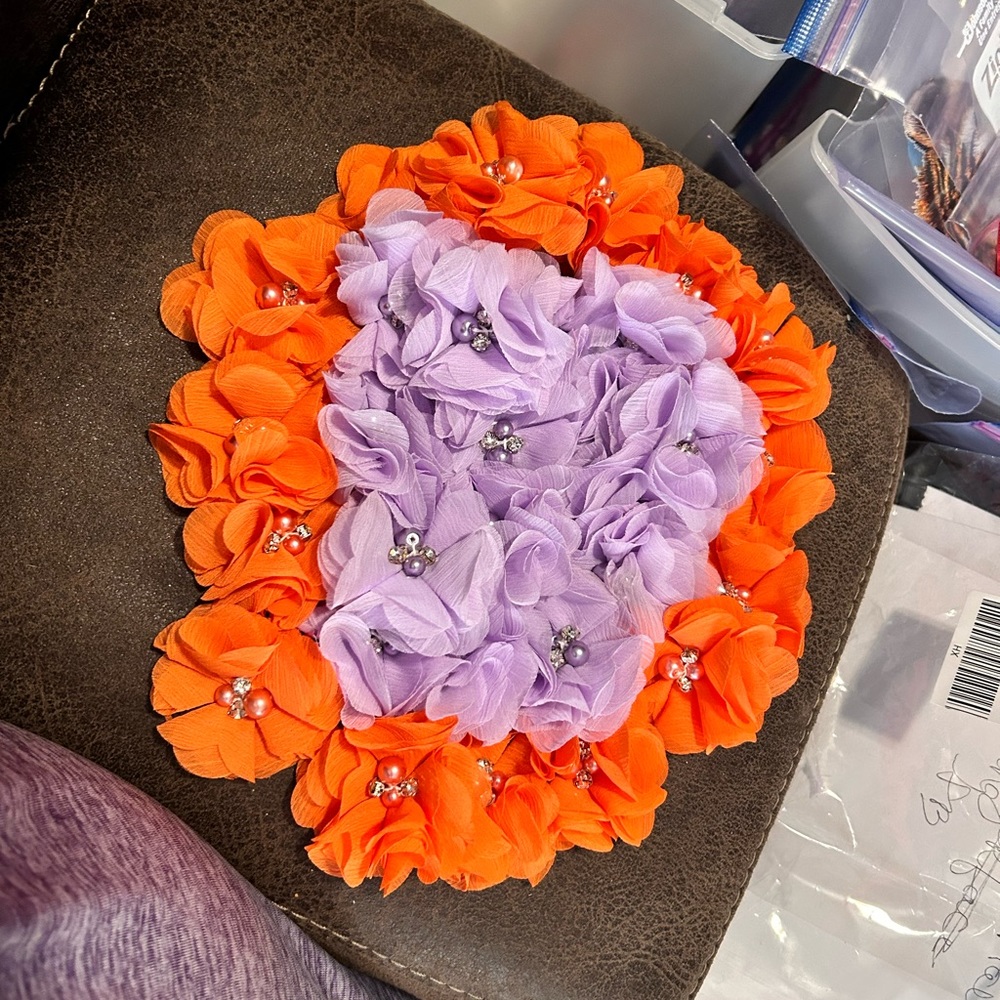 Clemson Tiger themed hand made flowers with a bejeweled center.